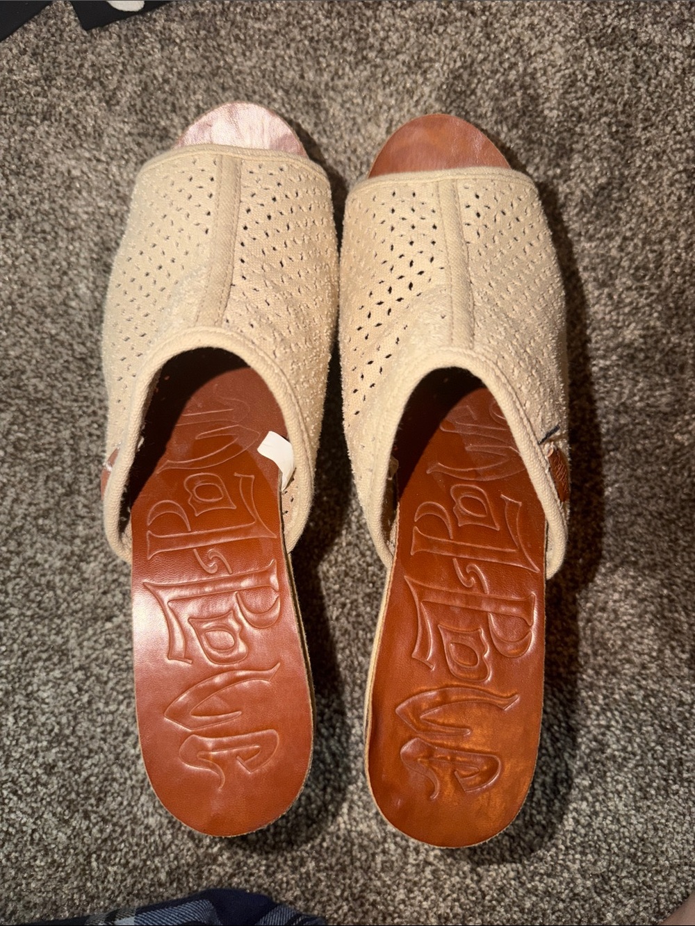 Mad Love beige canvas platform wedge mules with a perforated upper design